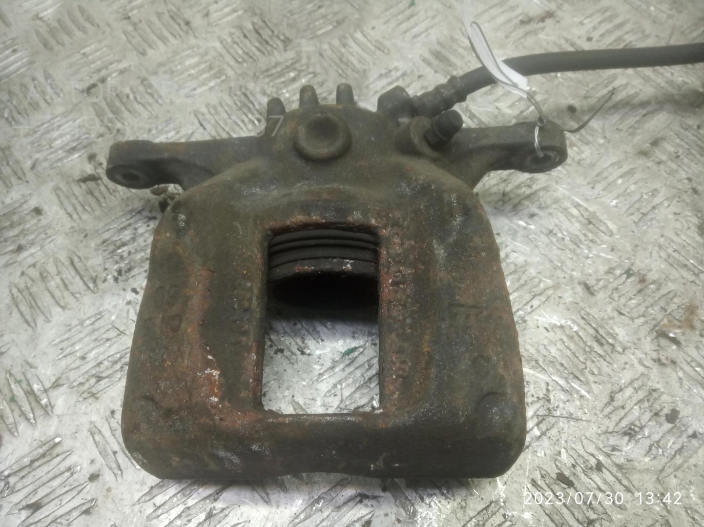 Суппорт передний левый