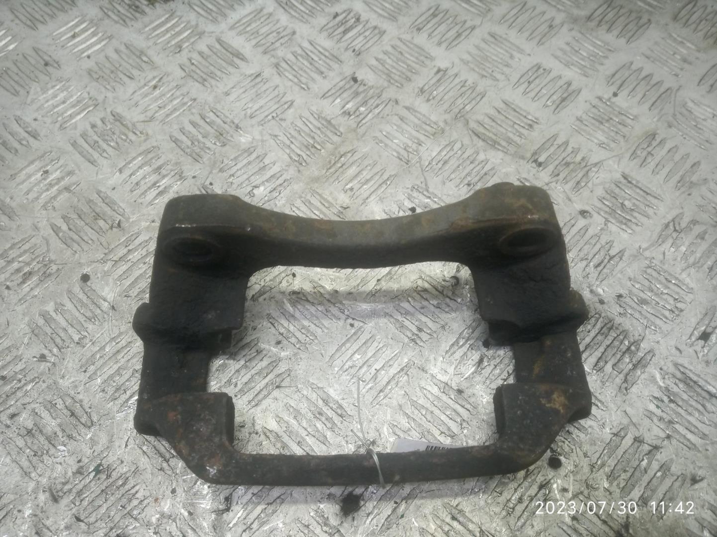 Скоба суппорта переднего