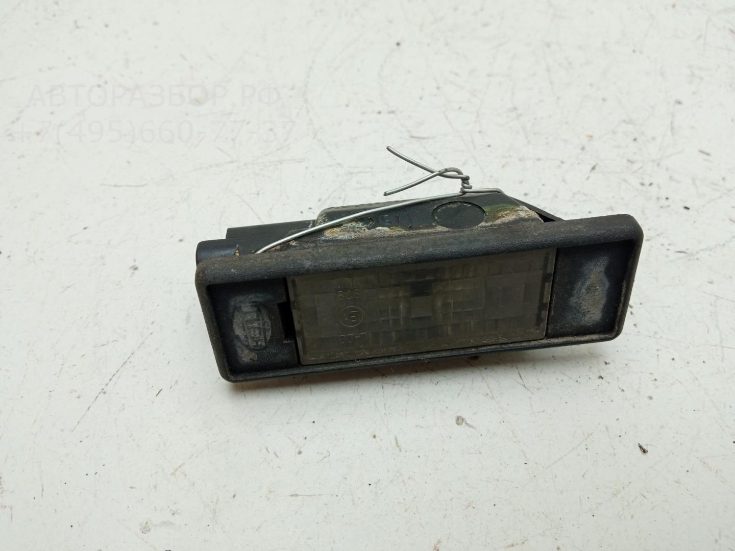 Фонарь подсветки номера