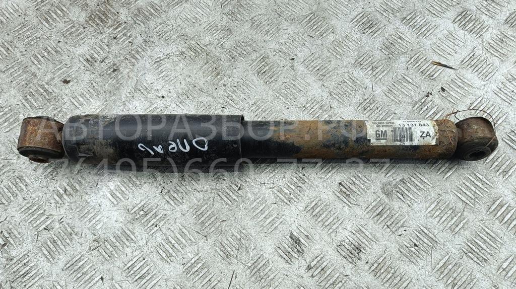 Амортизатор задний левый