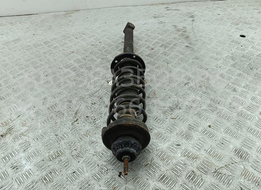 Амортизатор задний левый