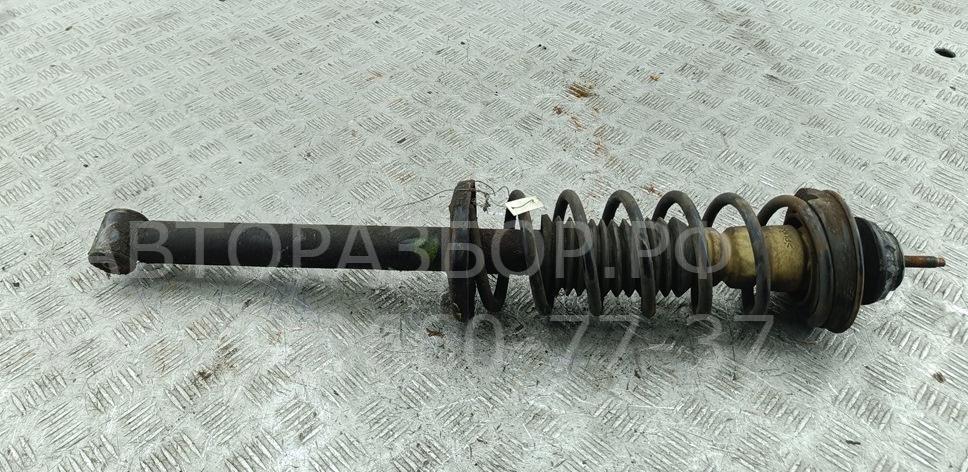 Амортизатор задний левый