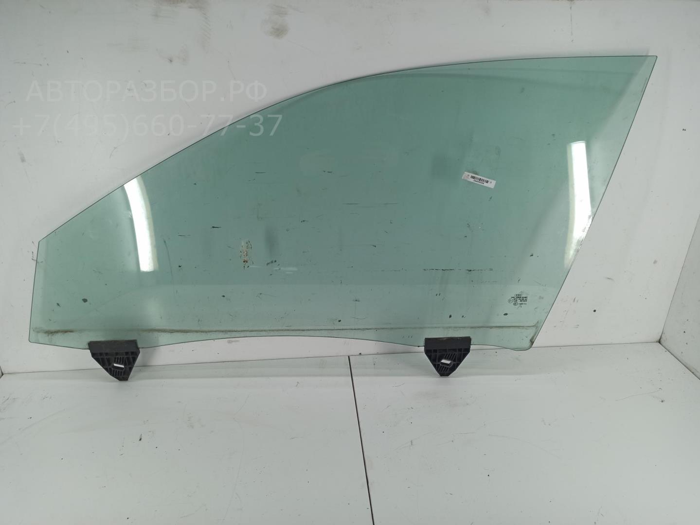 Стекло двери передней левой