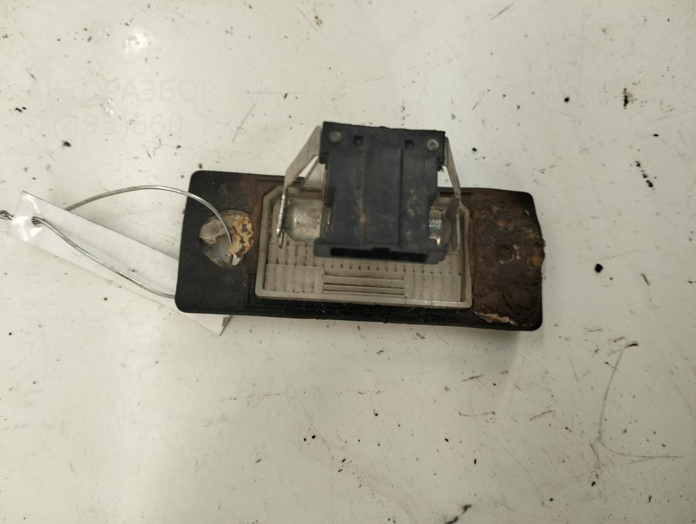 Фонарь подсветки номера