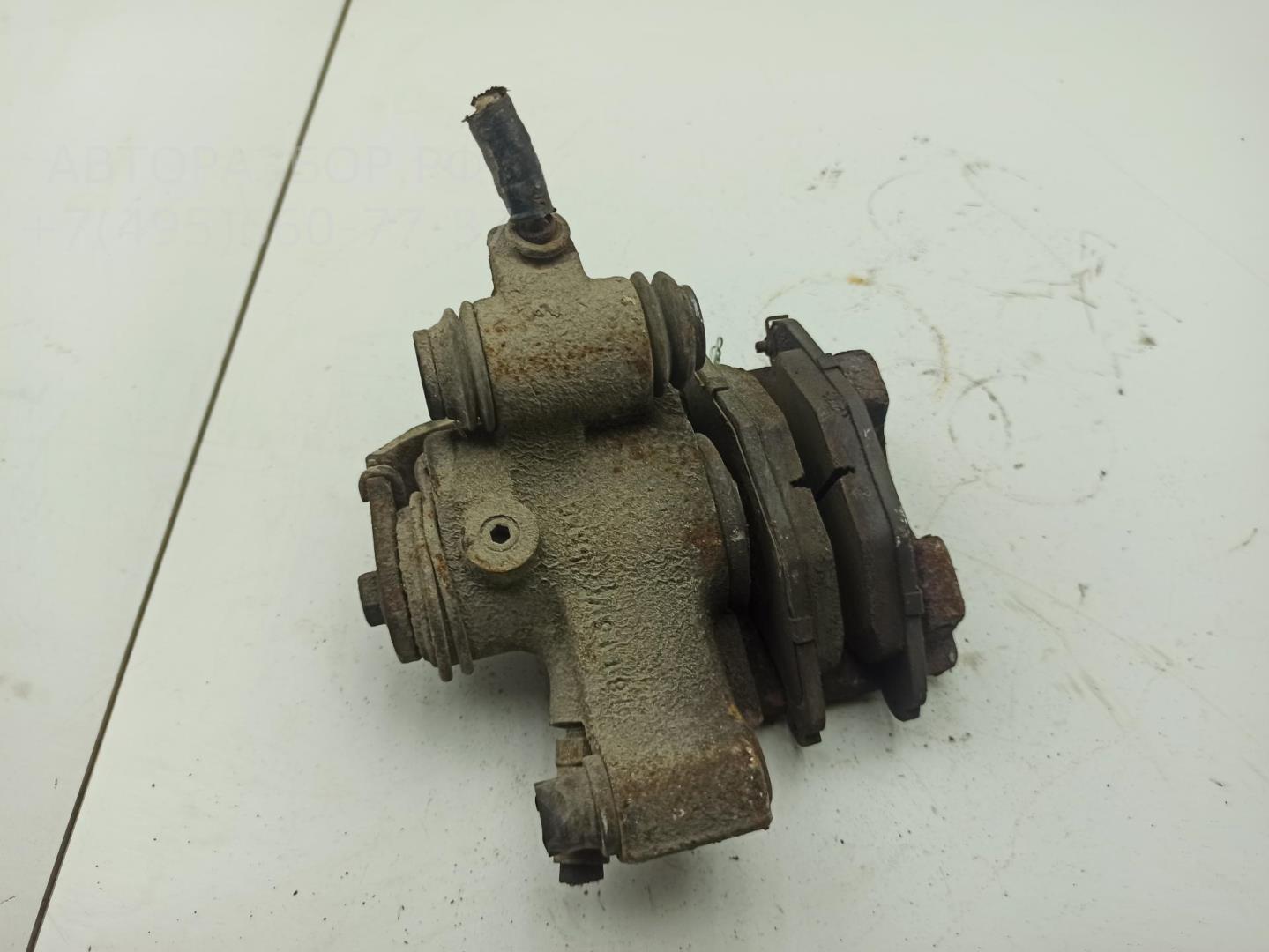 Суппорт задний левый