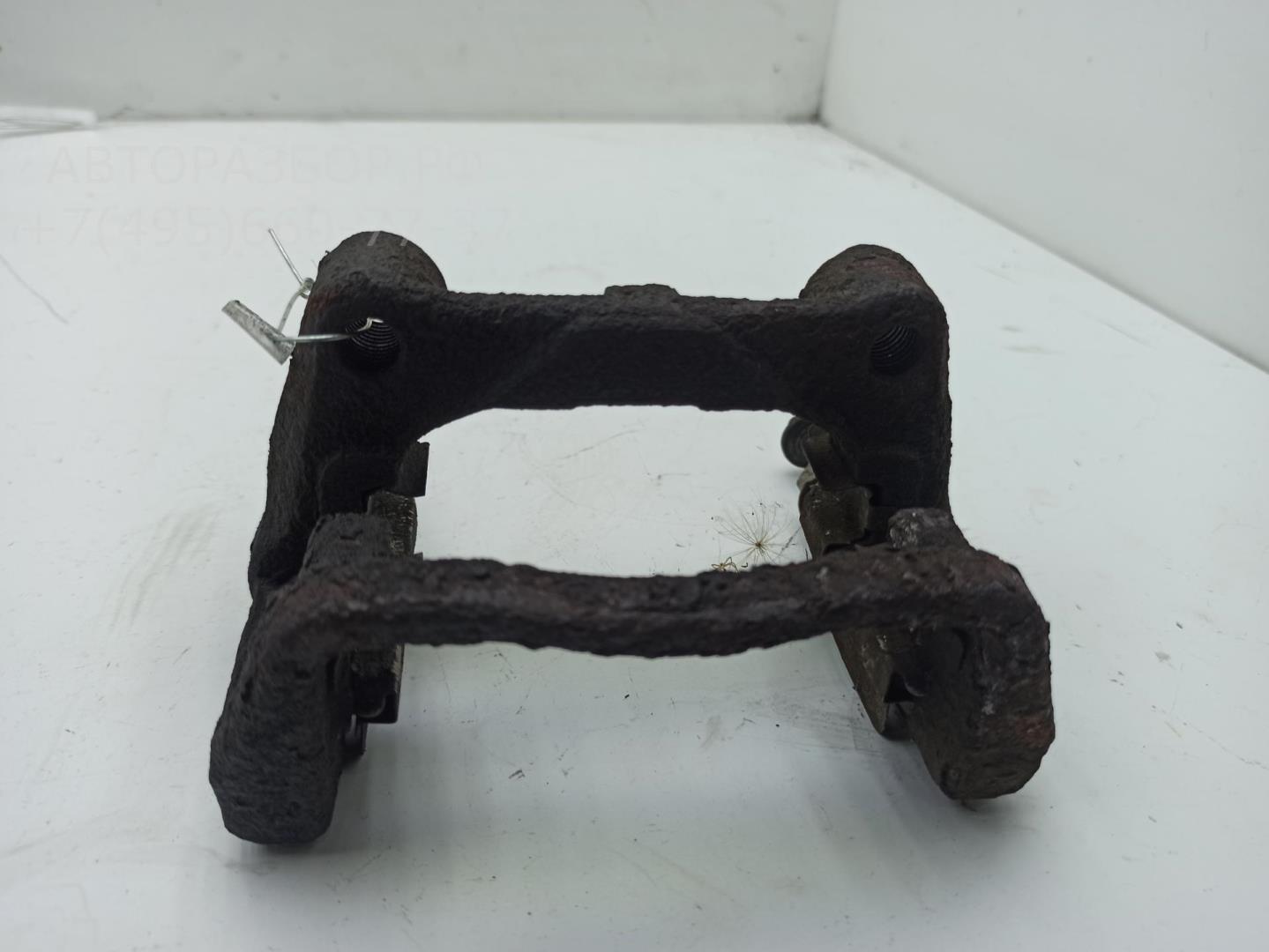 Скоба суппорта заднего