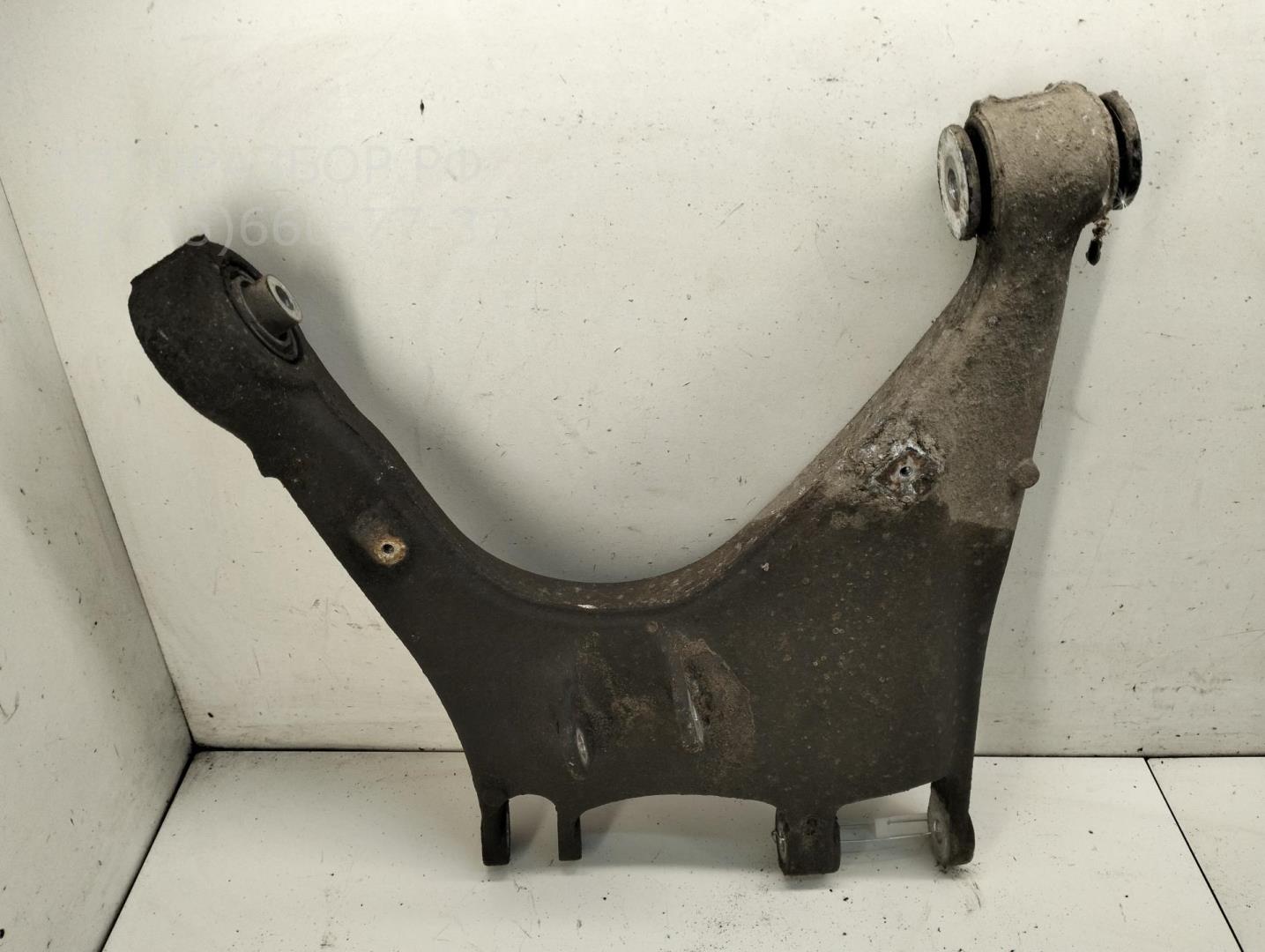 Рычаг задний левый