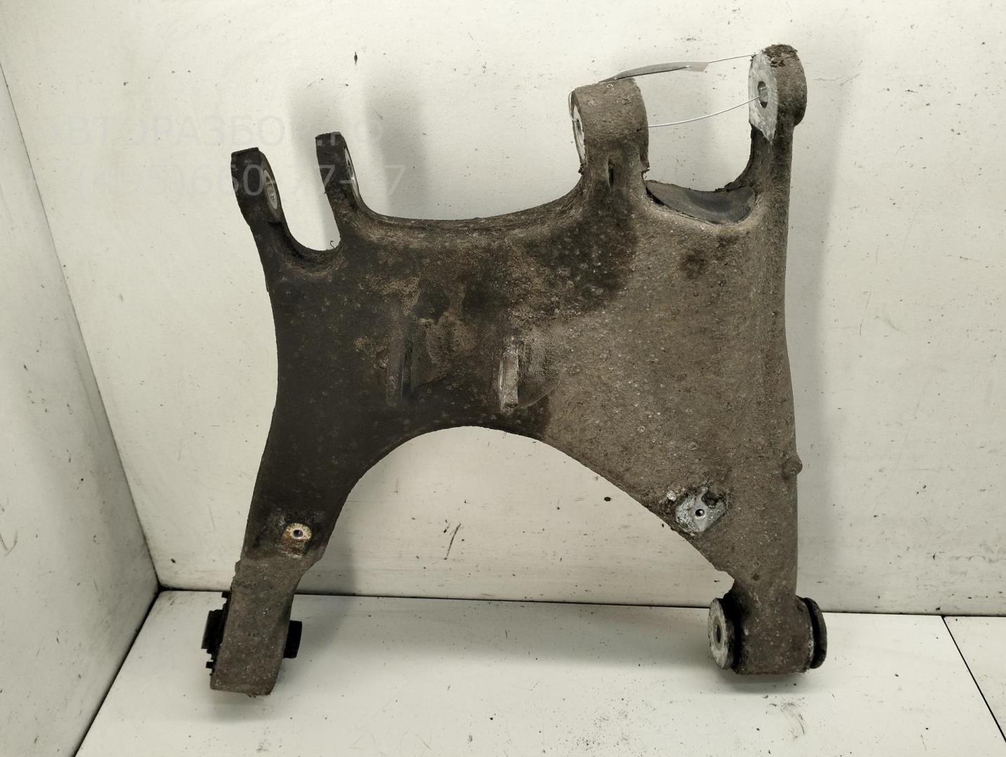 Рычаг задний левый