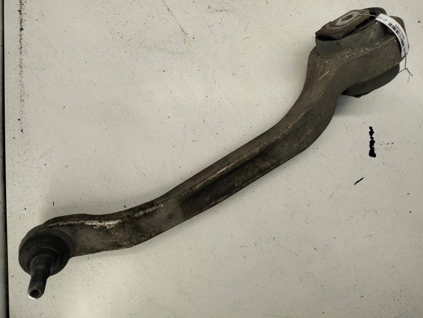 Рычаг передний левый