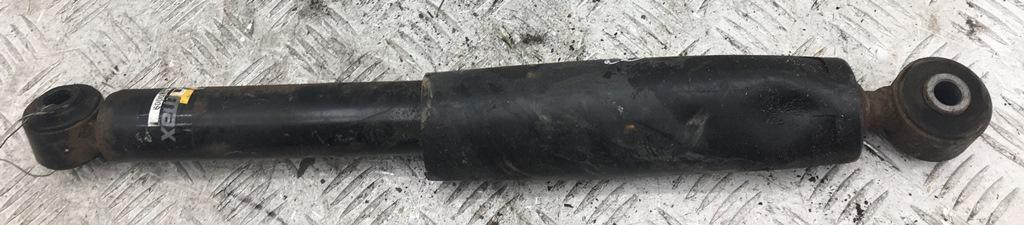 Амортизатор задний левый