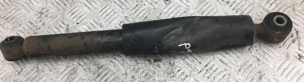 Амортизатор задний левый