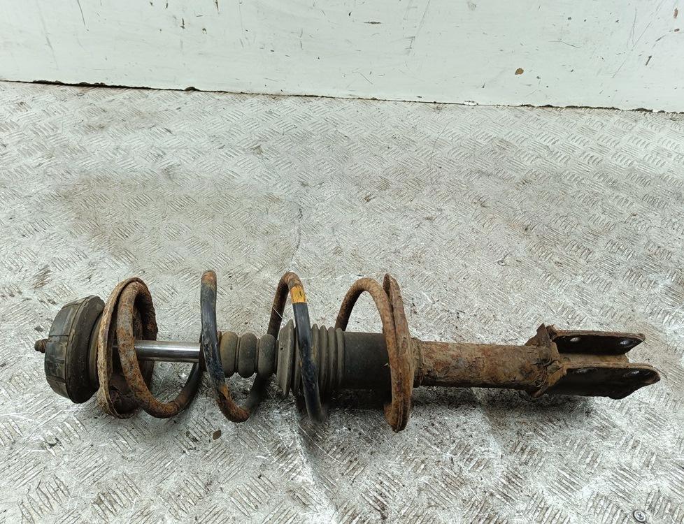 Амортизатор передний левый