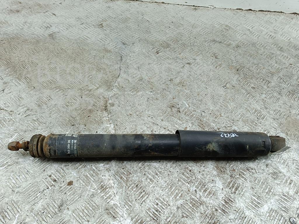 Амортизатор задний левый