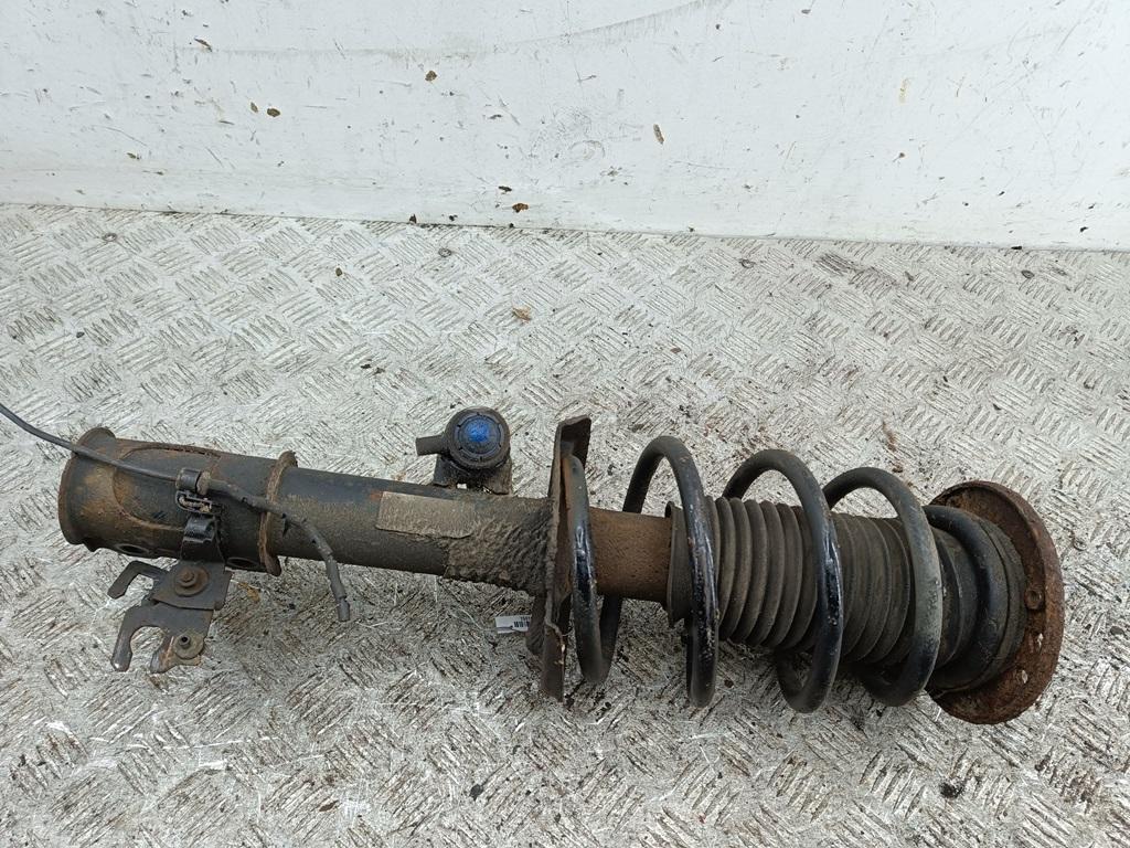 Амортизатор передний левый