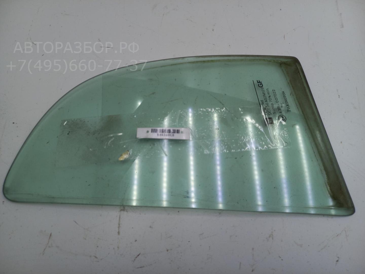 Стекло двери задней левой (форточка)