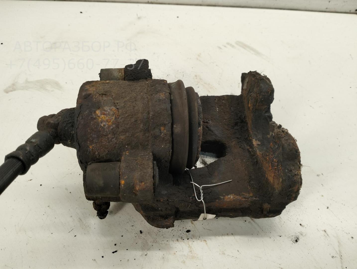 Суппорт передний левый