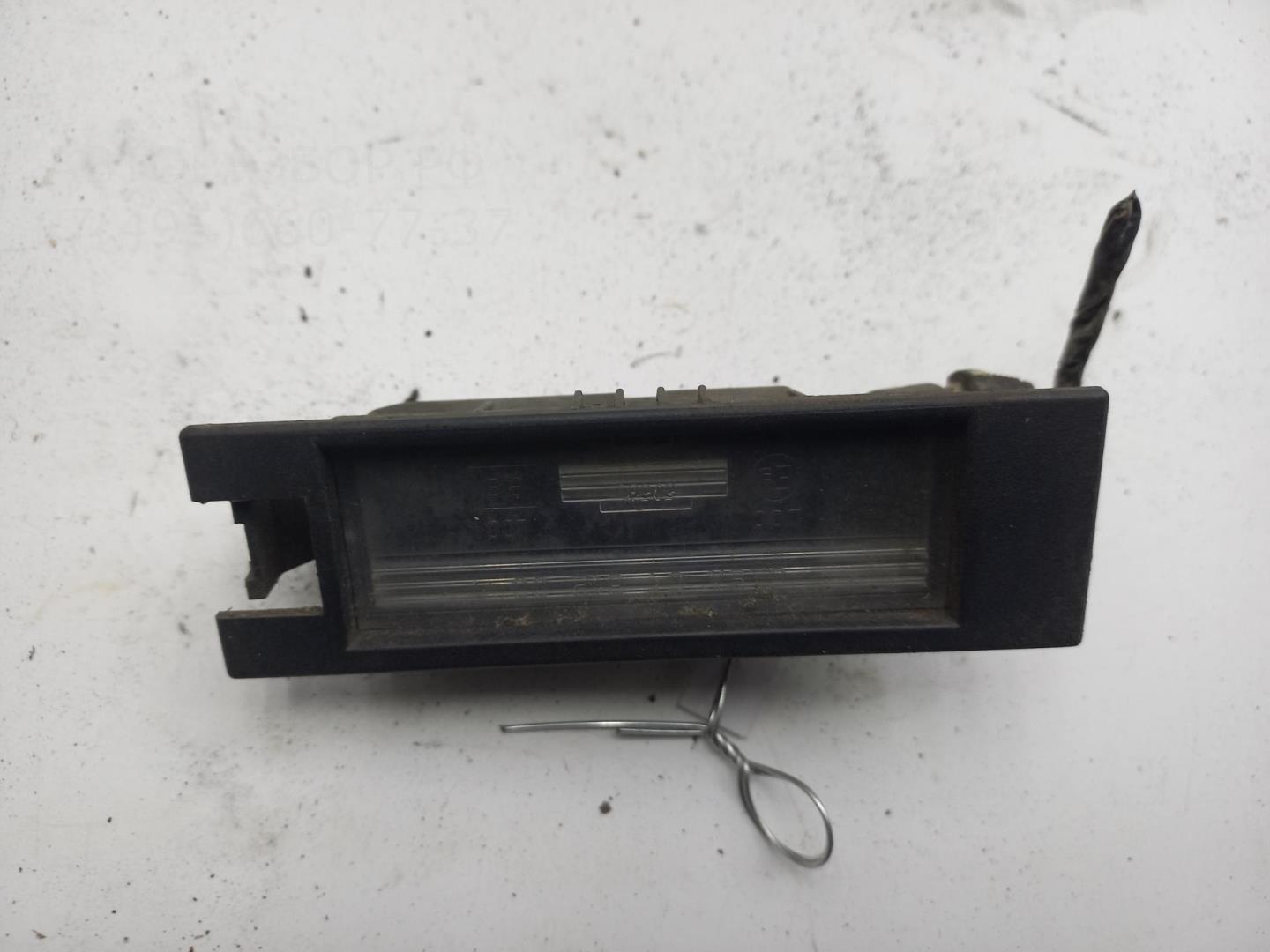 Фонарь подсветки номера