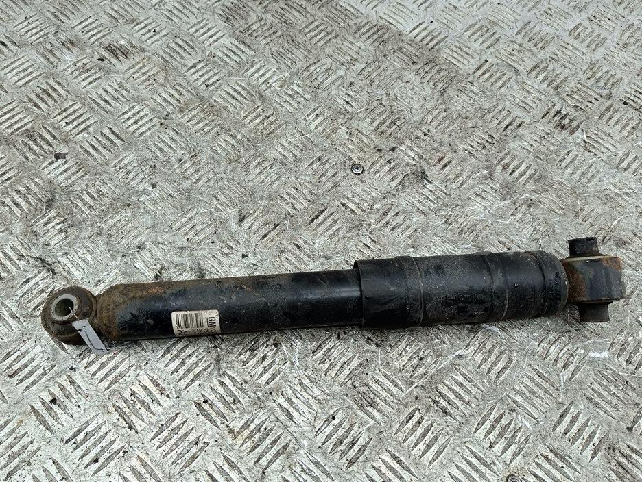 Амортизатор задний левый