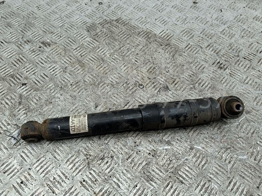 Амортизатор задний левый