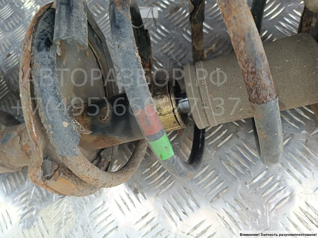 Амортизатор передний левый