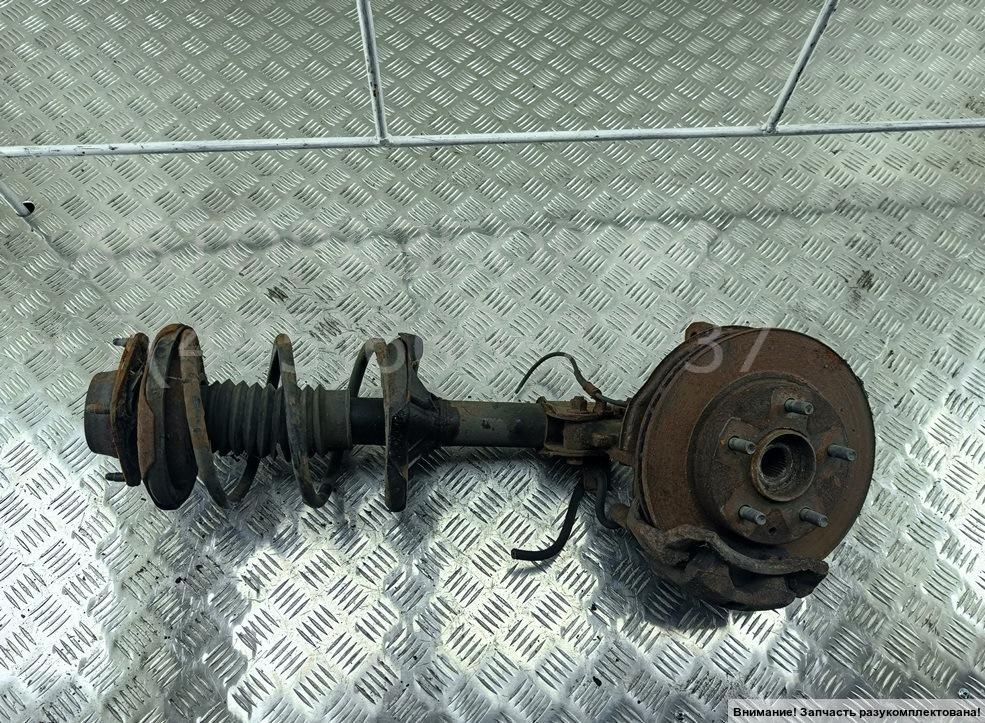 Амортизатор передний левый