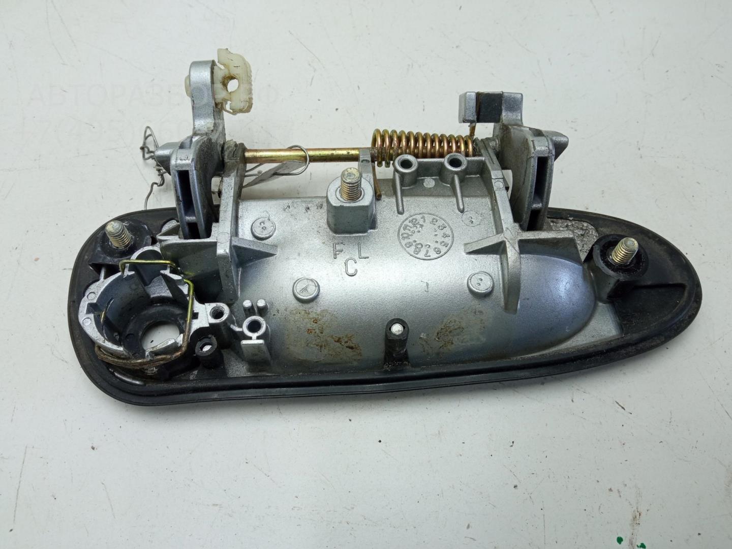 Ручка двери передней наружная левая