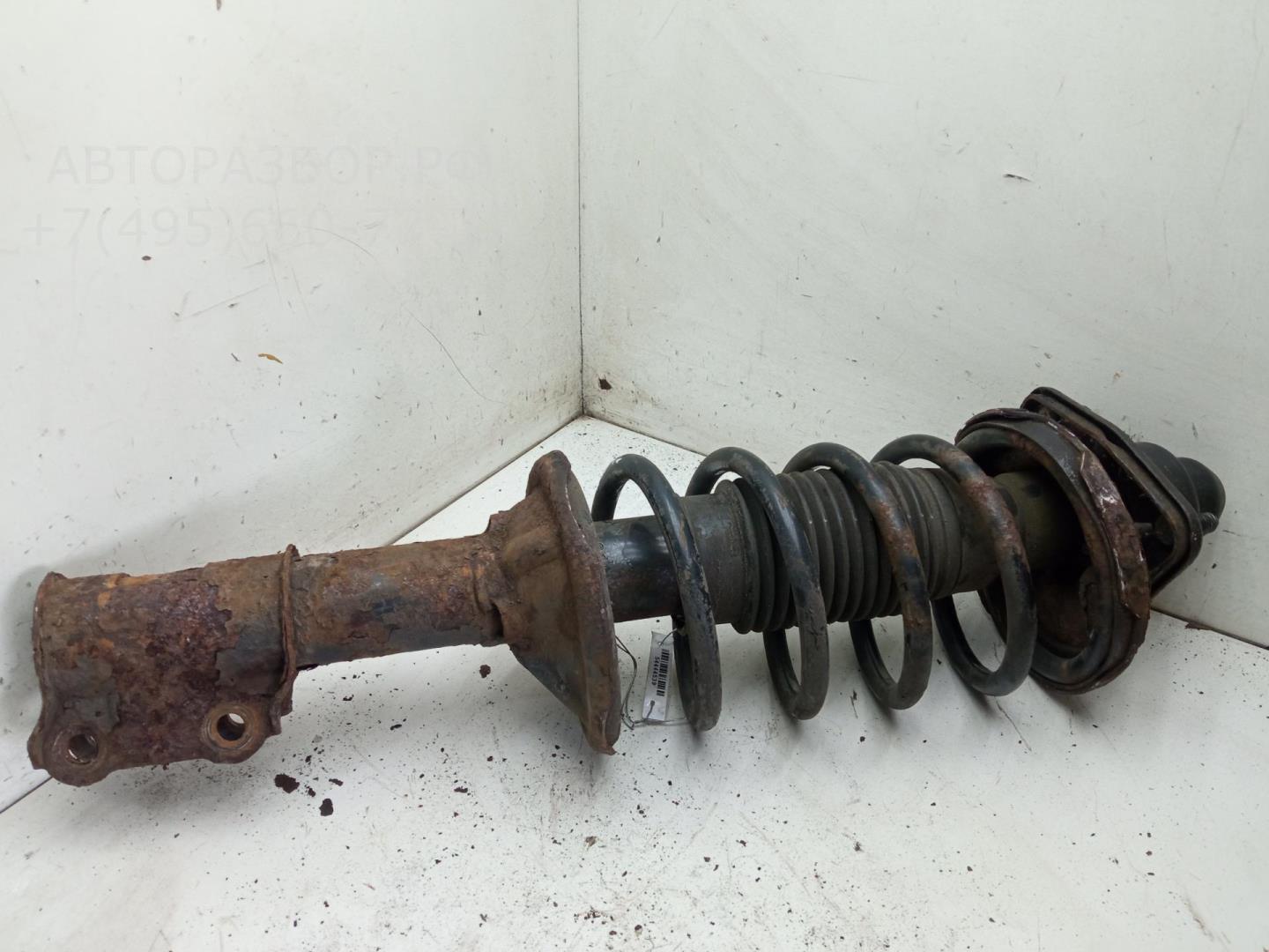 Амортизатор передний левый