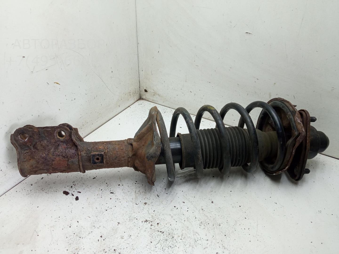 Амортизатор передний левый