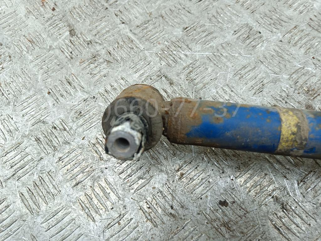 Амортизатор задний левый