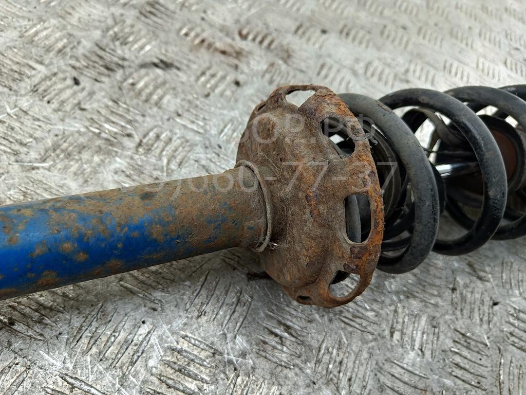 Амортизатор задний левый