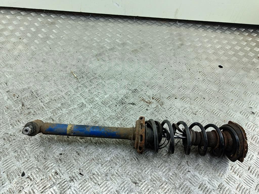 Амортизатор задний левый