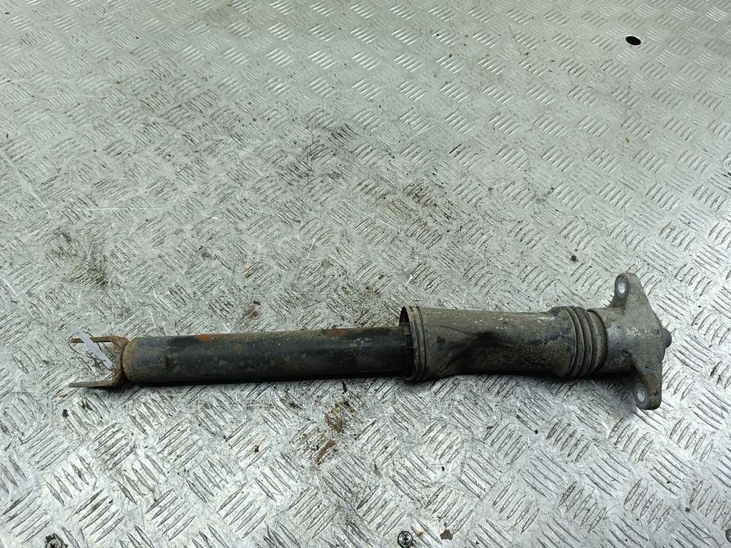 Амортизатор задний левый