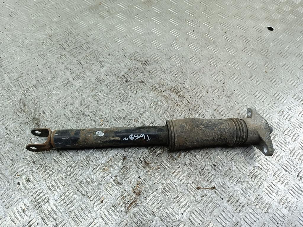 Амортизатор задний левый