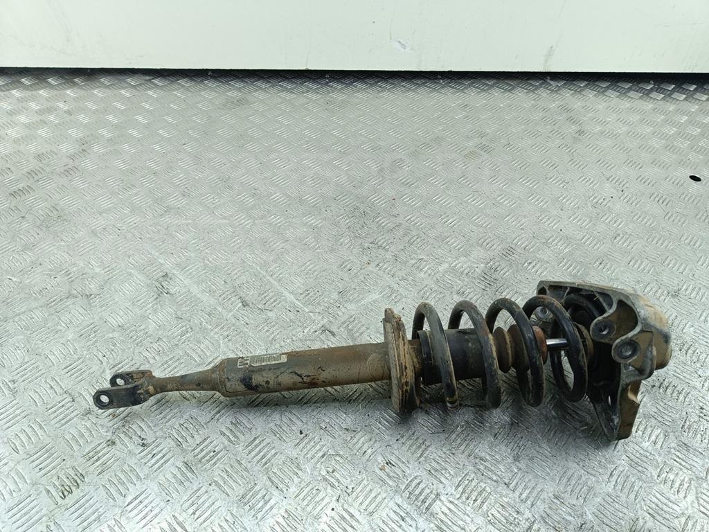 Амортизатор передний левый