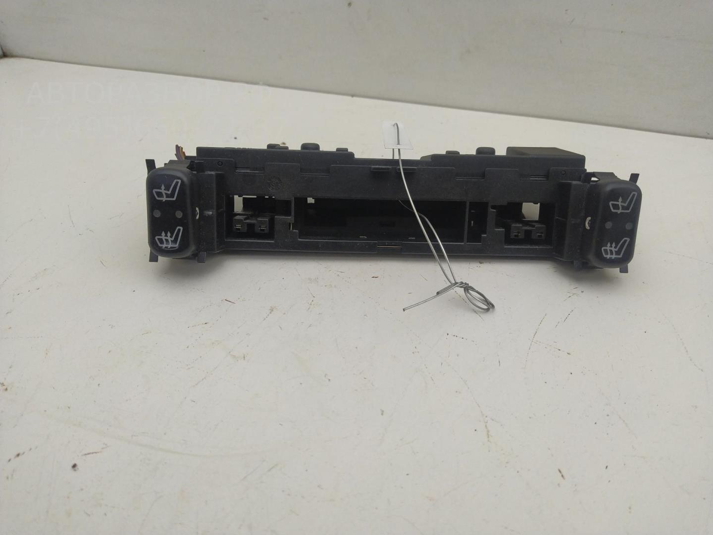 Кнопка обогрева сидений