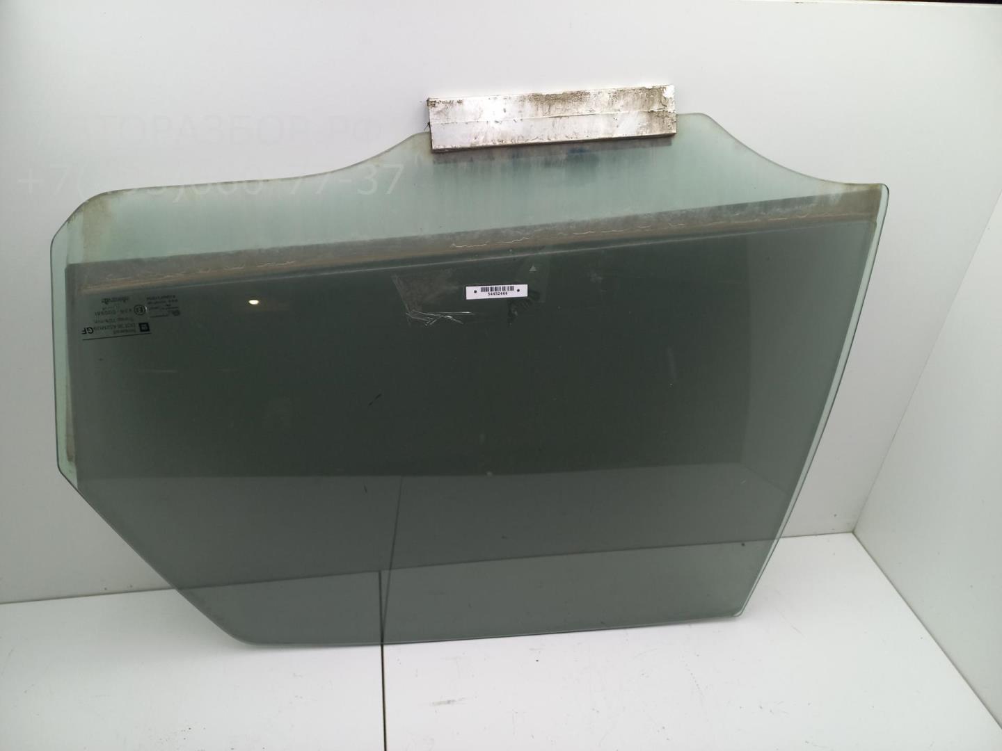 Стекло двери задней левой