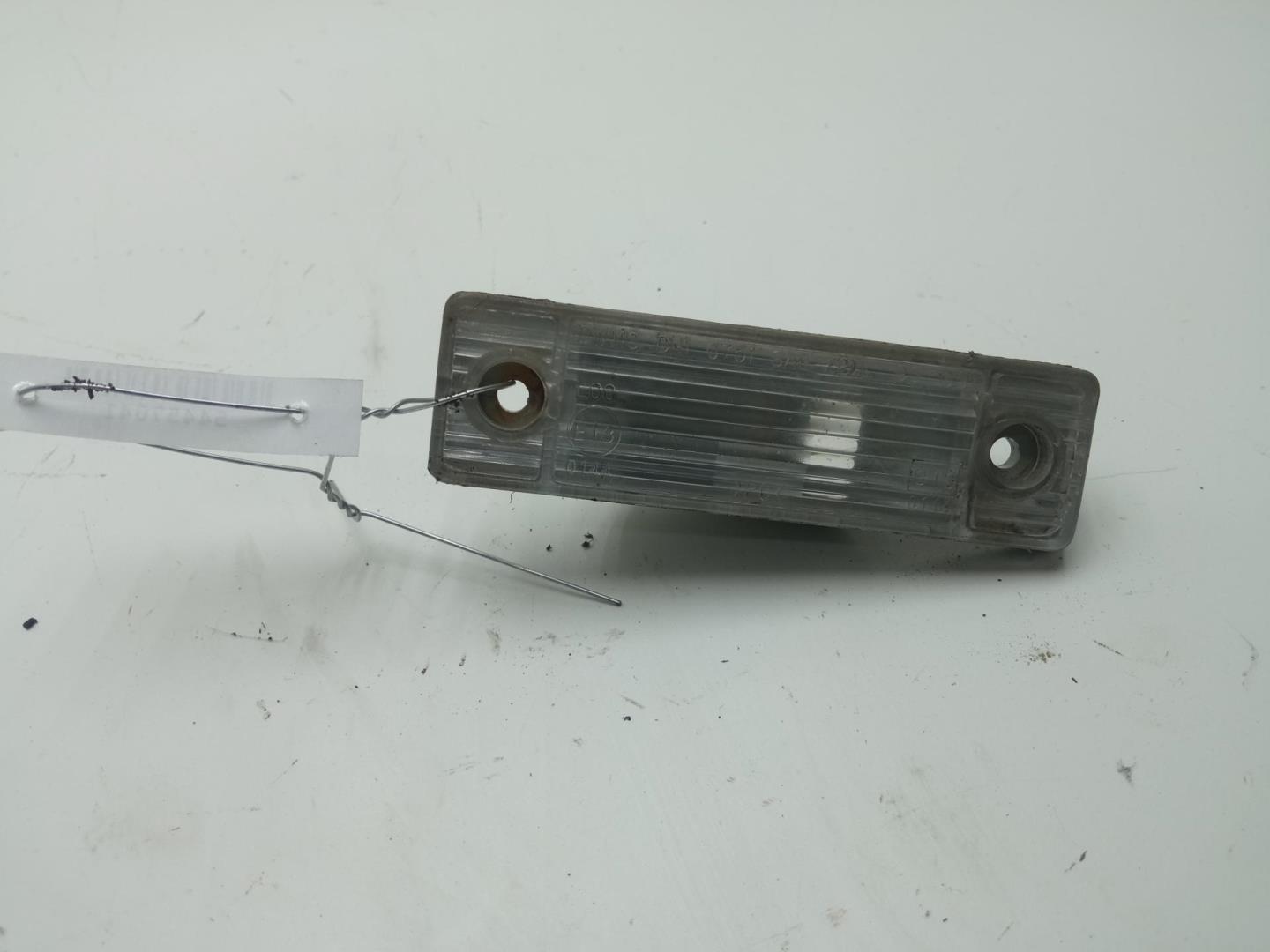 Фонарь подсветки номера