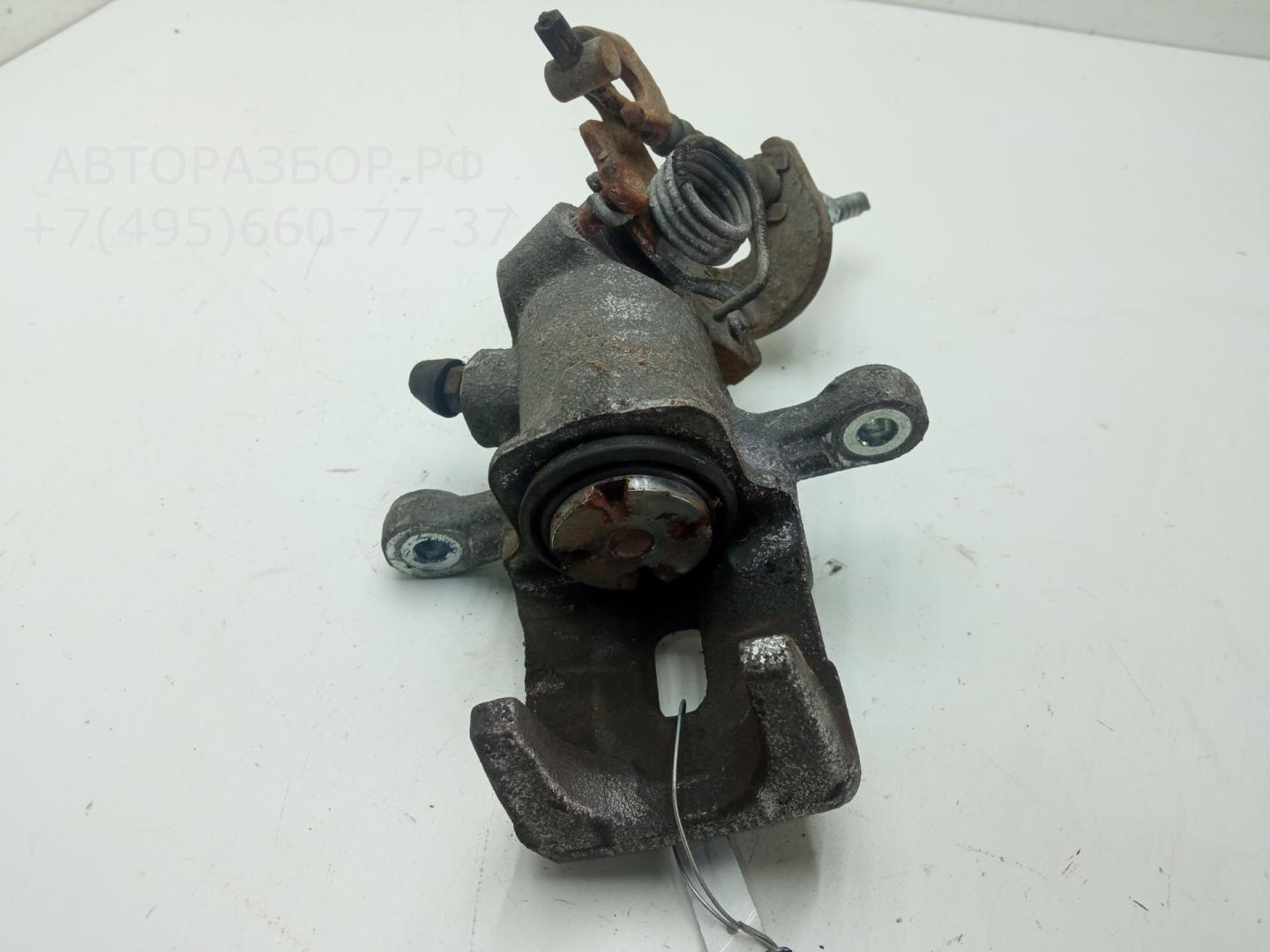 Суппорт задний левый