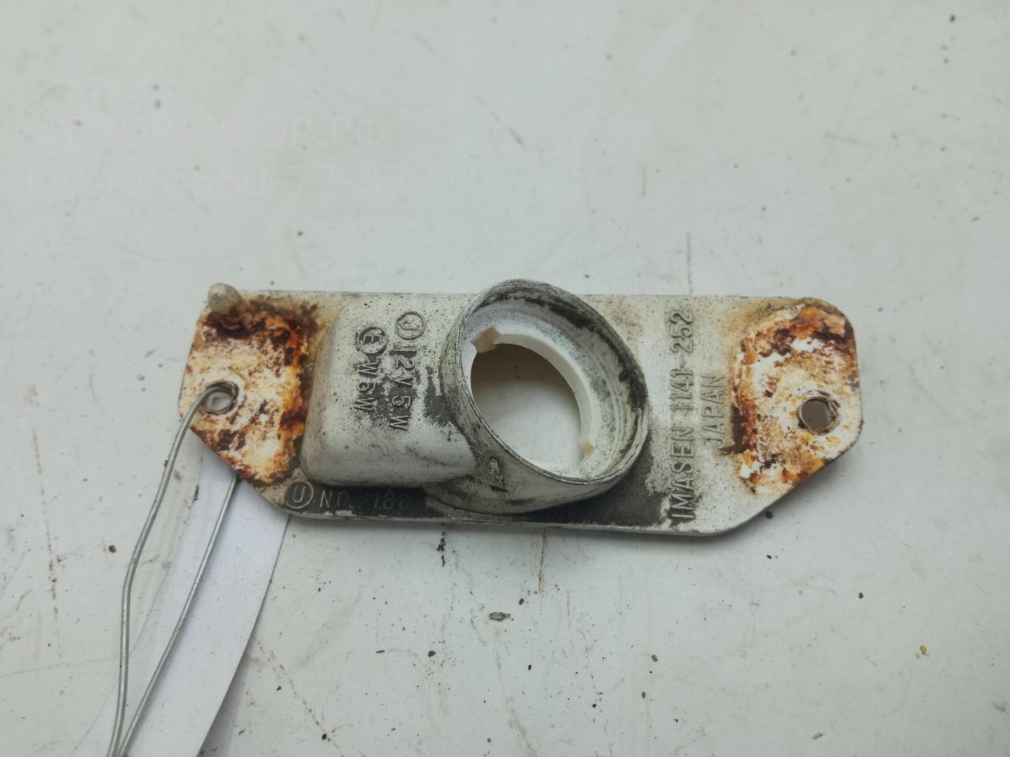 Фонарь подсветки номера