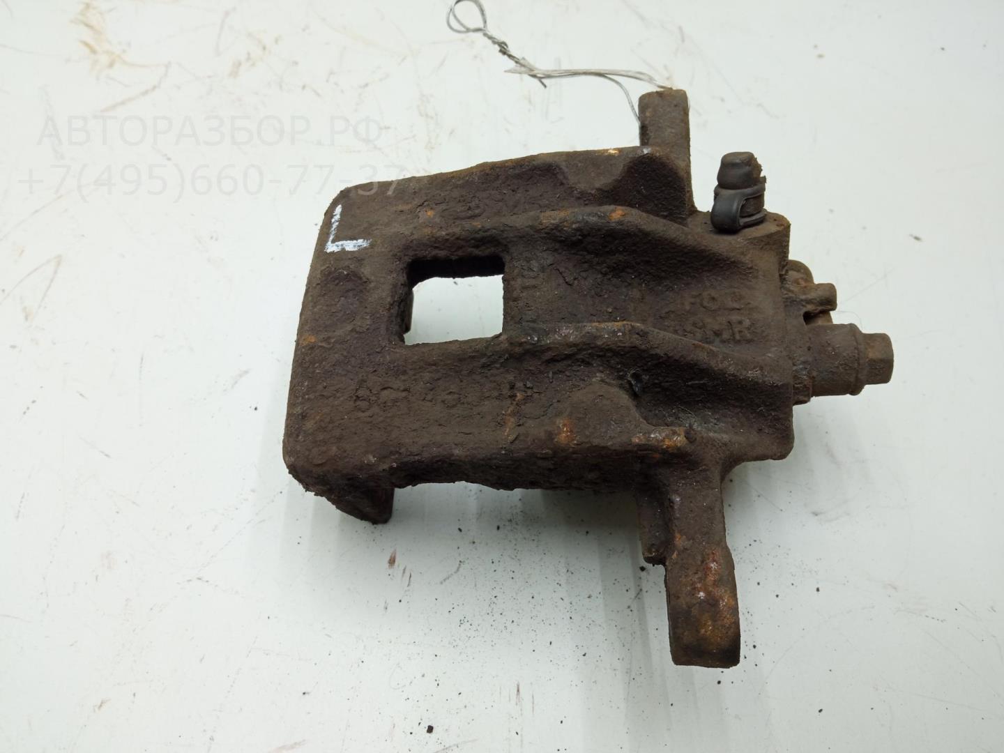 Суппорт задний левый