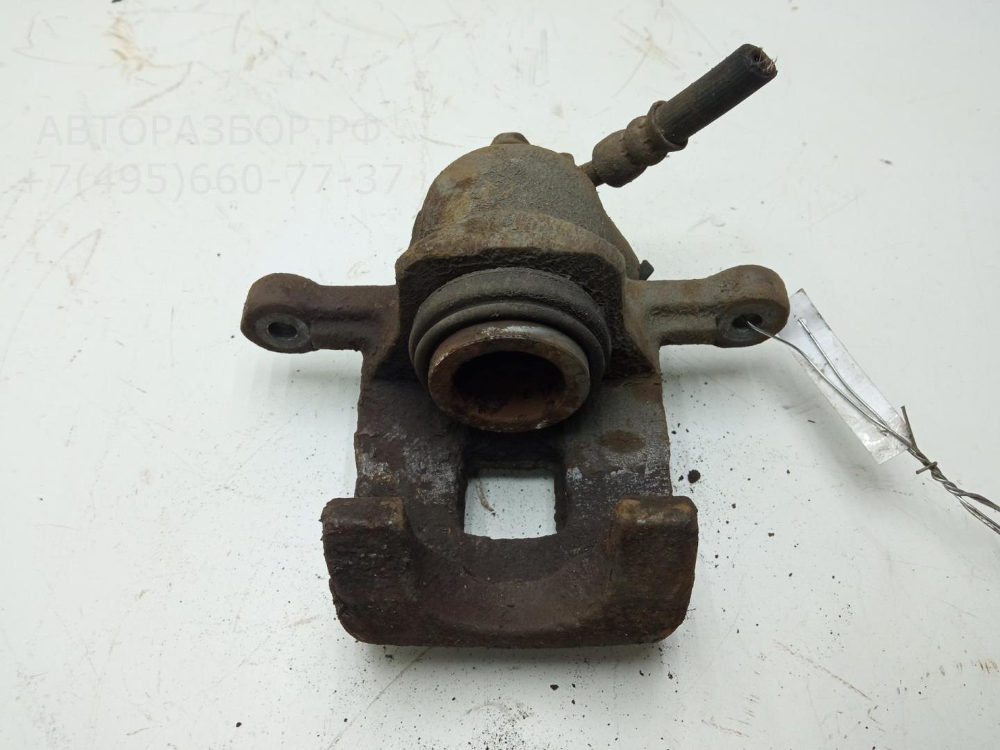 Суппорт задний левый