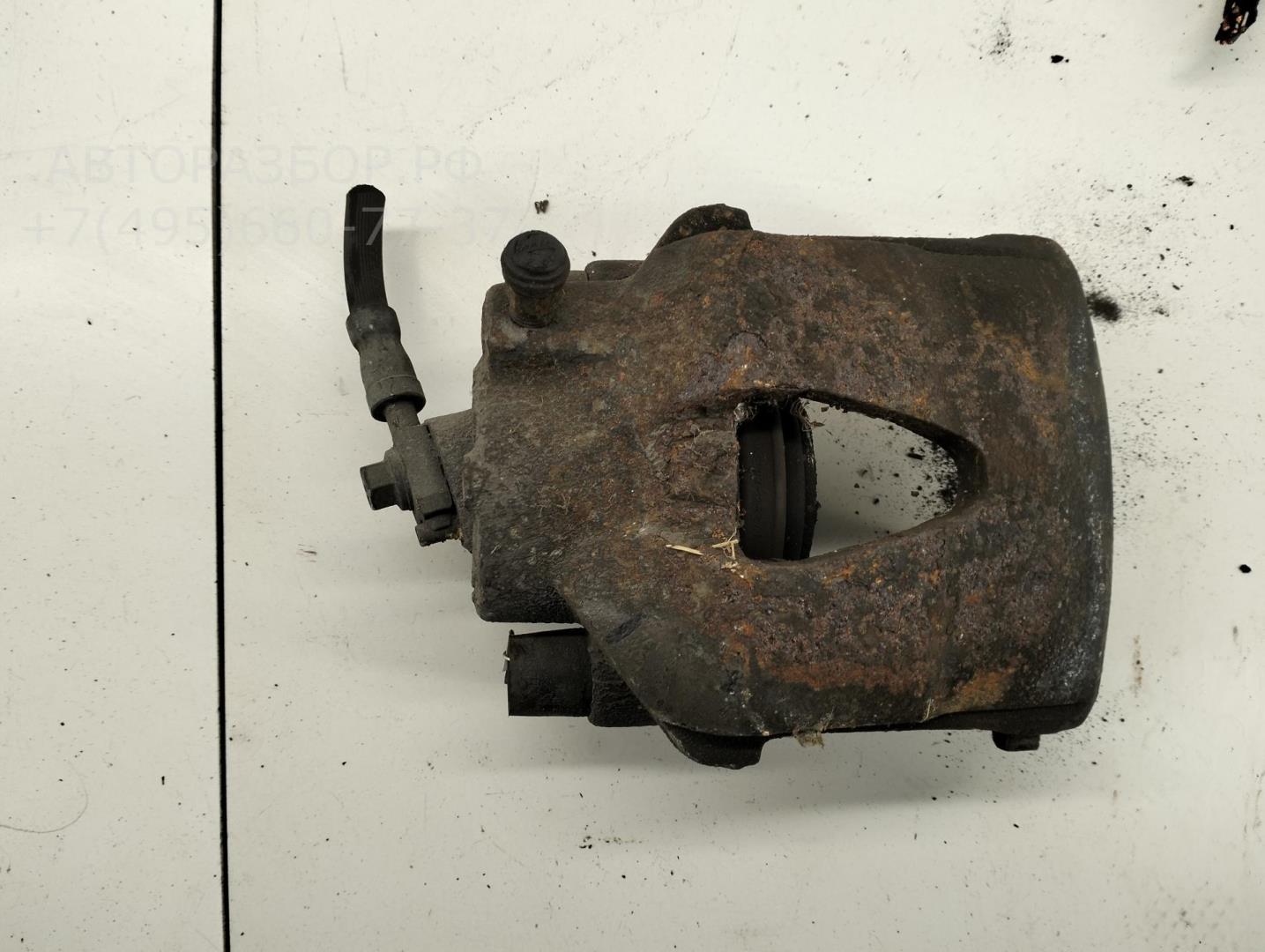 Суппорт передний левый