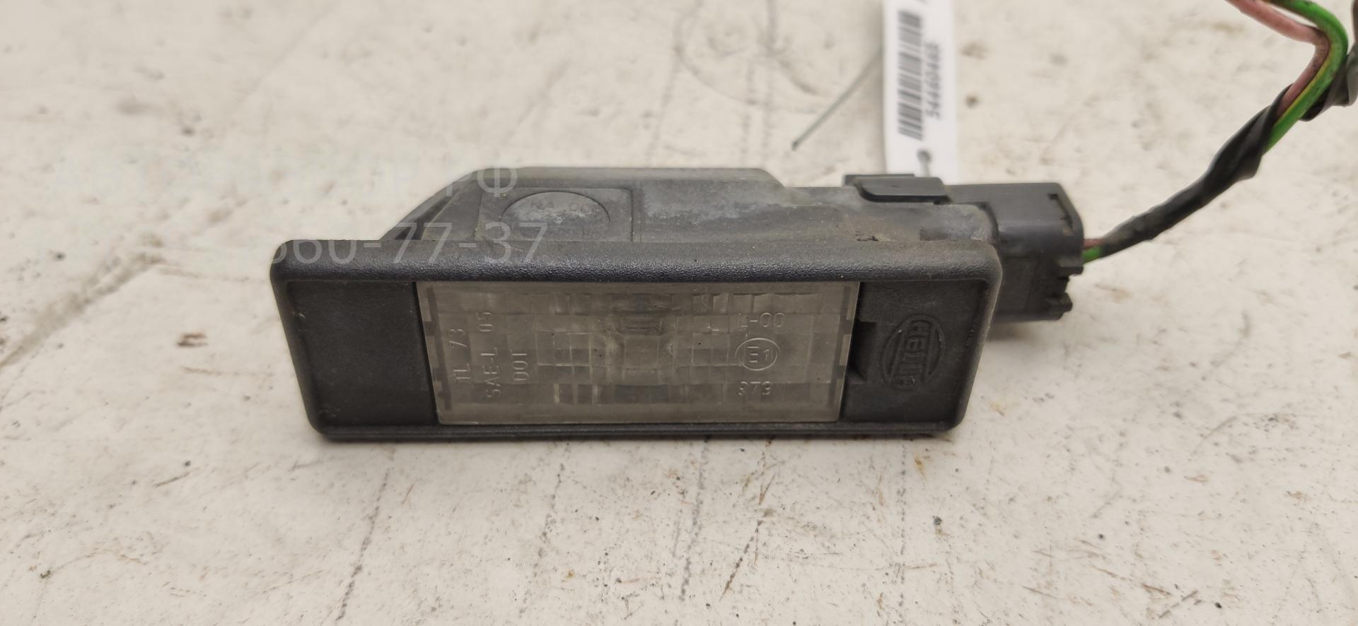 Фонарь подсветки номера