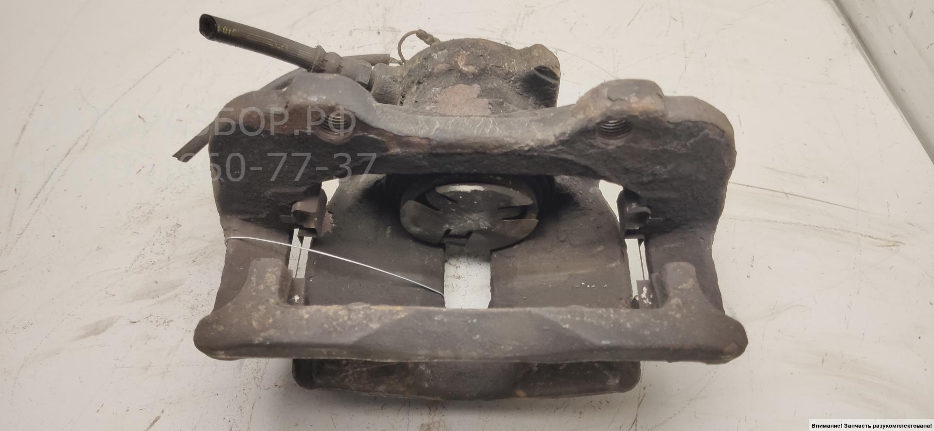 Суппорт передний левый