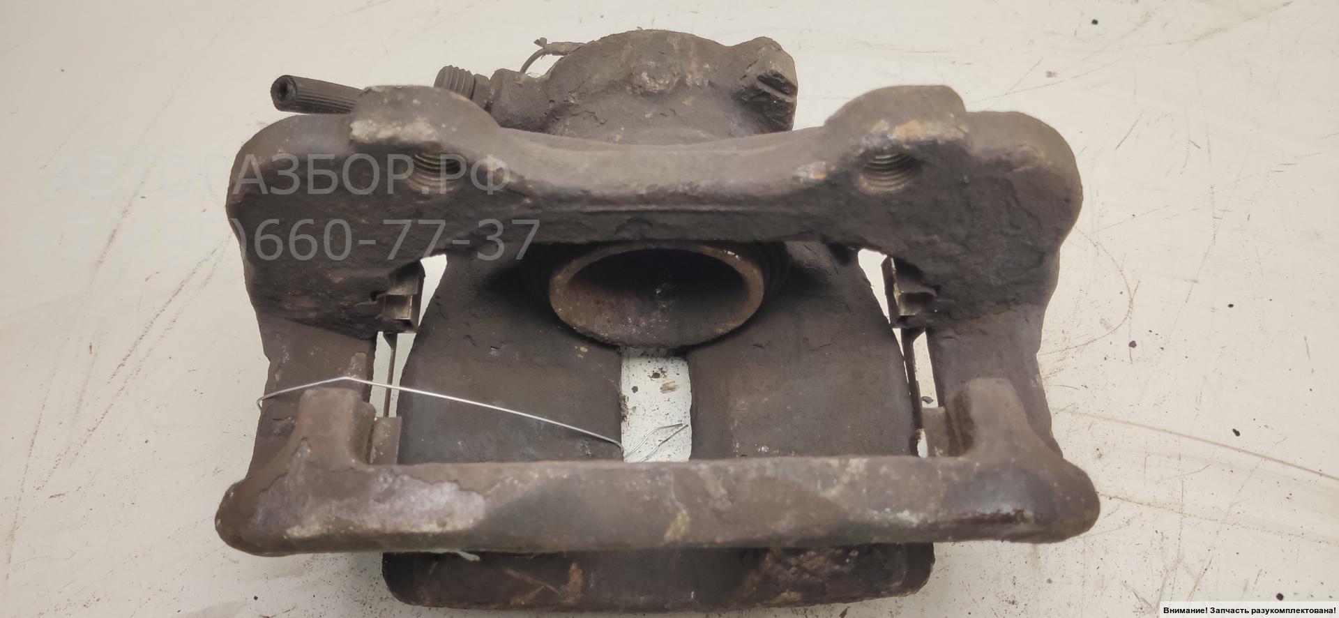 Суппорт передний левый