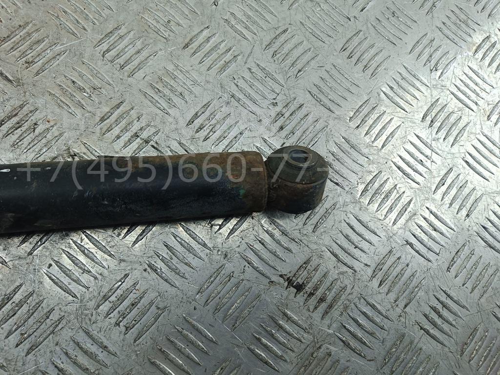 Амортизатор задний левый