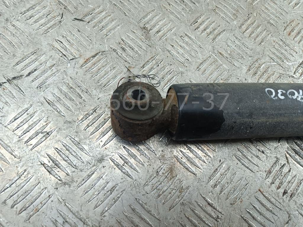 Амортизатор задний левый