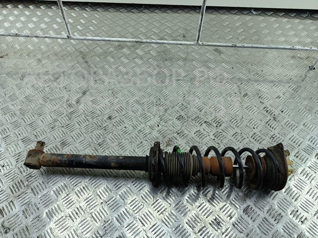 Амортизатор задний левый