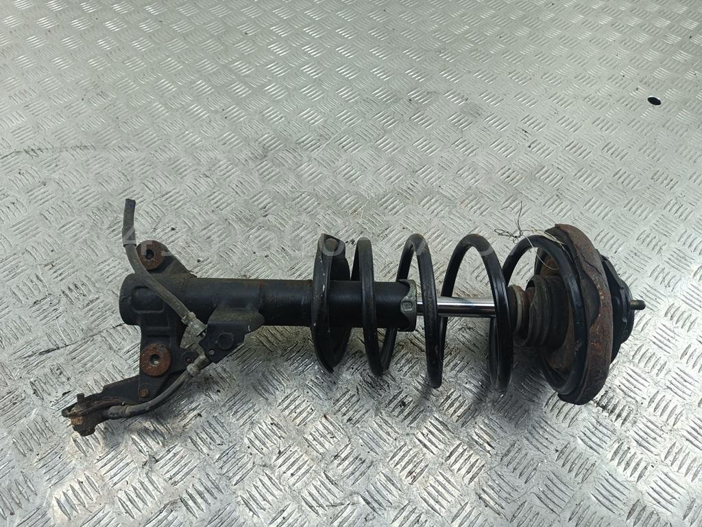 Амортизатор передний левый