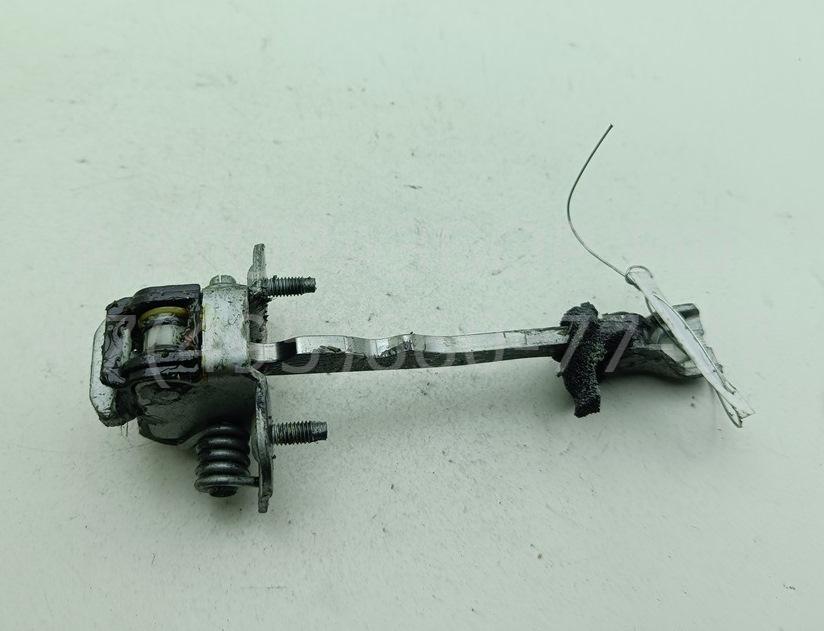 Ограничитель двери